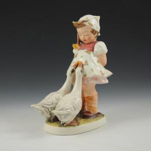 Girl with geese